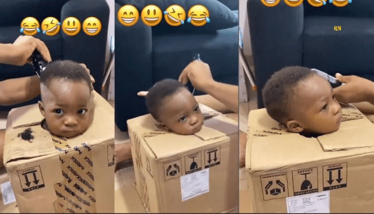 “Children will test you” – Video trends as mother placed her son inside a carton while barbing for him (Video)